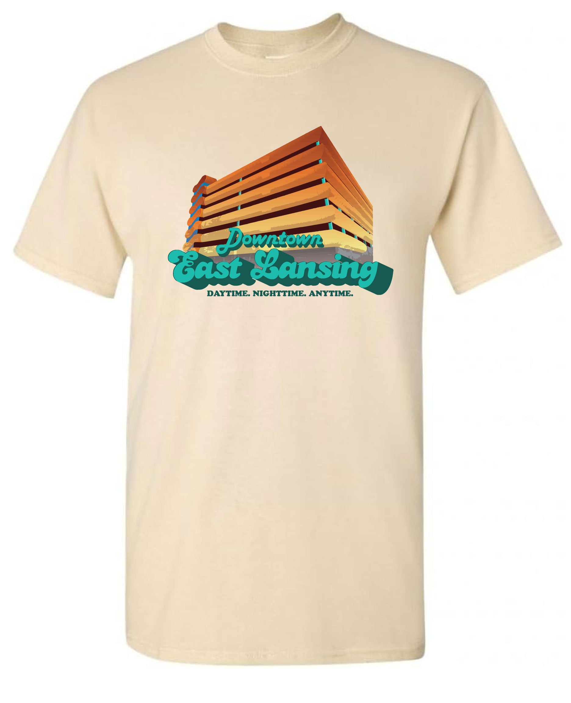 Image is a natural colored t-shirt with an image of the Division Street Parking Garage, a colorful parking garage in downtown East Lansing, on the front side. Beneath the garage, the text “Downtown East Lansing: Daytime. Nighttime. Anytime” is displayed.