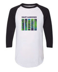 Image is a white with black-sleeved basetball t-shirt with 5 images of public art and architecture within downtown East Lansing. Above the images, the text “East Lansing” is displayed.