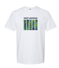 Image is a white t-shirt with 5 images of public art and architecture within downtown East Lansing. Above the images, the text “East Lansing” is displayed.