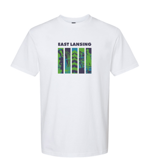 Image is a white t-shirt with 5 images of public art and architecture within downtown East Lansing. Above the images, the text “East Lansing” is displayed.